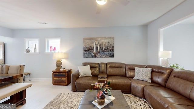 living room with ceiling fan