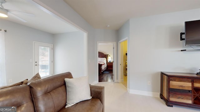 living room featuring ceiling fan