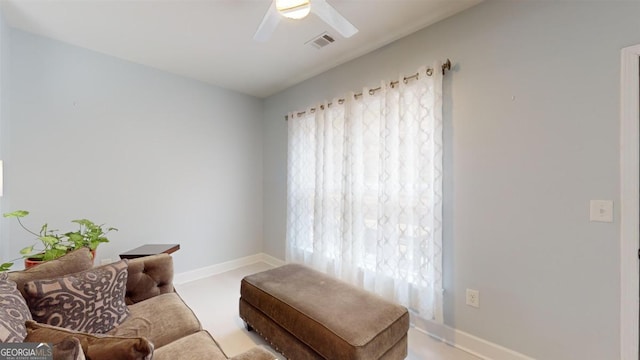 living room with ceiling fan