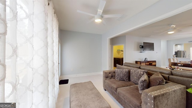 living room with ceiling fan