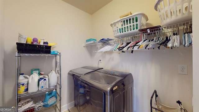 laundry room featuring washer and clothes dryer