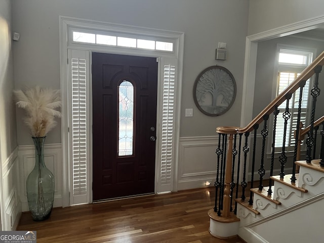 foyer entrance with dark hardwood / wood-style flooring