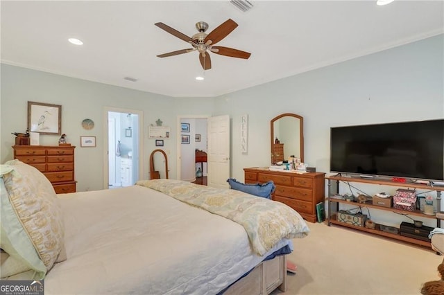 carpeted bedroom featuring ceiling fan and ensuite bathroom