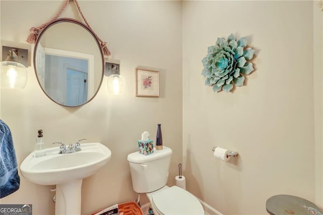 bathroom featuring toilet