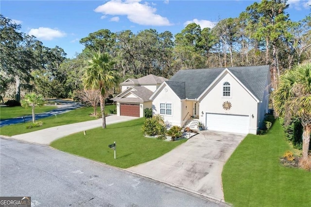 view of front of property with a front lawn and a garage