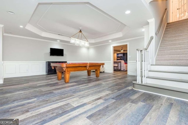 playroom featuring billiards, ornamental molding, and a raised ceiling