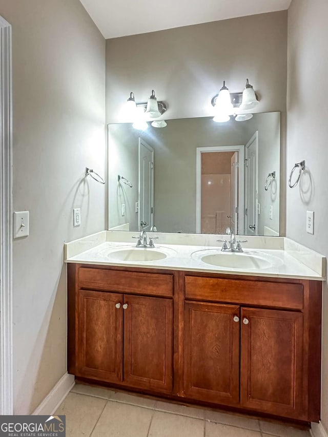 bathroom with vanity and tile patterned floors