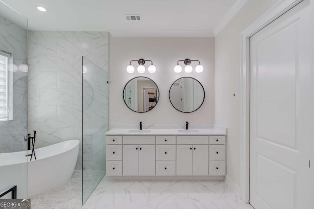 bathroom featuring vanity, a bathing tub, and crown molding