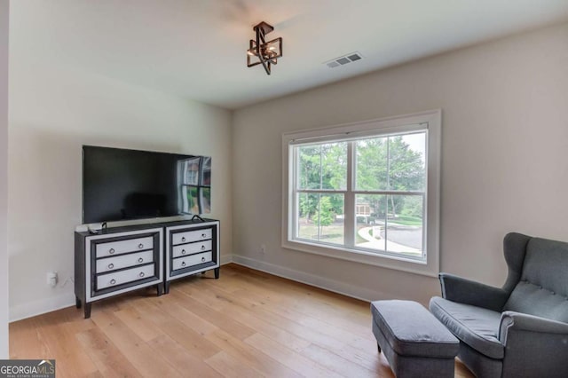 living area featuring light hardwood / wood-style floors