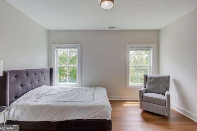 bedroom featuring hardwood / wood-style floors