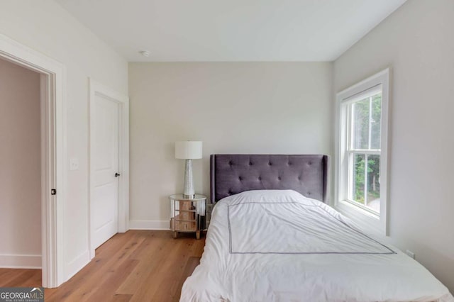 bedroom featuring light hardwood / wood-style flooring