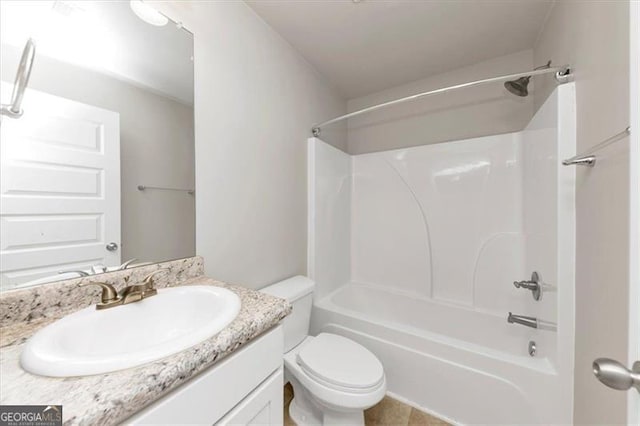 full bathroom with vanity,  shower combination, and toilet