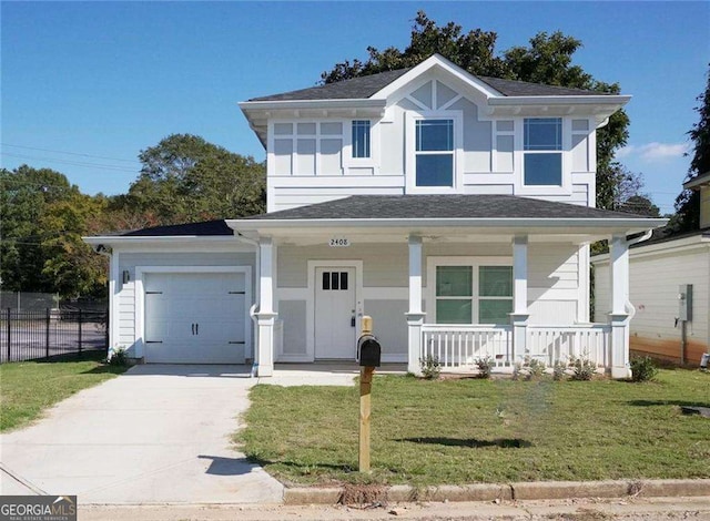 view of front of house with covered porch, a front lawn, and a garage