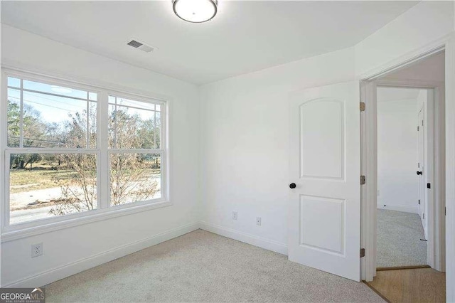 view of carpeted spare room