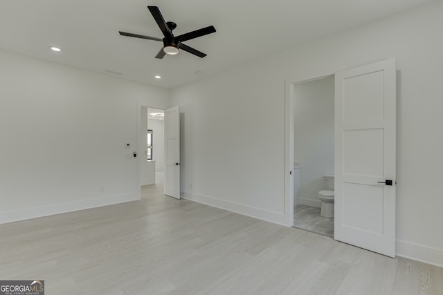 unfurnished bedroom with ceiling fan, light hardwood / wood-style floors, and connected bathroom