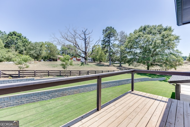 deck featuring a yard