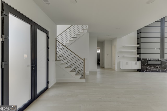 interior space with light hardwood / wood-style flooring