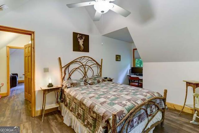 bedroom featuring ceiling fan, vaulted ceiling, and dark hardwood / wood-style floors