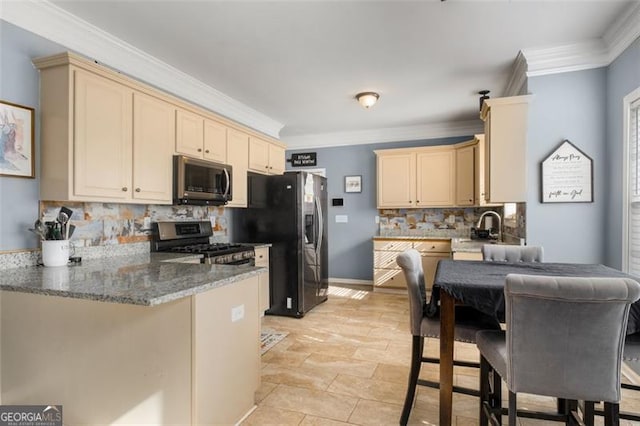 kitchen with kitchen peninsula, stainless steel appliances, tasteful backsplash, stone counters, and crown molding