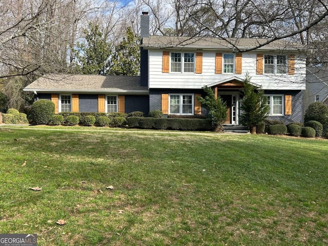 view of front facade featuring a front yard