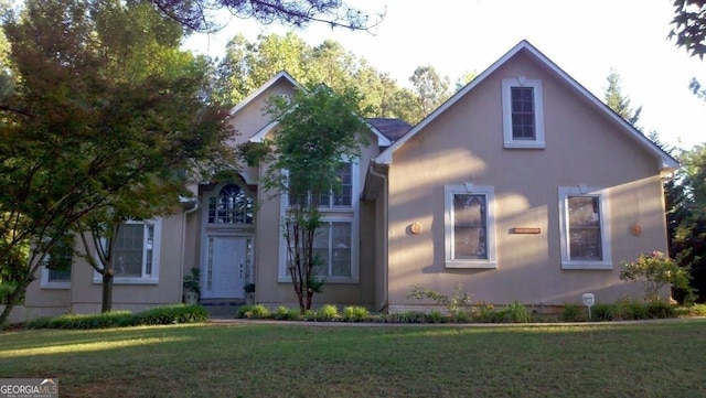 view of front of house with a front yard