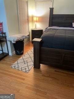 bedroom with light wood-type flooring