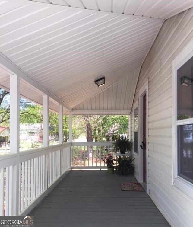 wooden deck featuring a porch