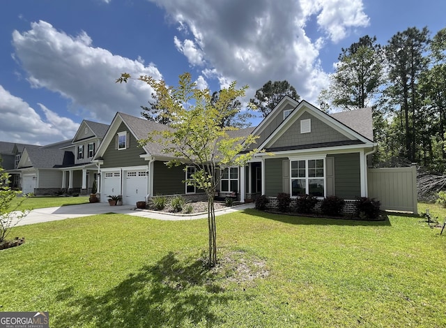 143 Madeira Dr, Brunswick, GA 31523 - craftsman inspired home featuring concrete driveway, a front yard, a garage, and a shingled roof