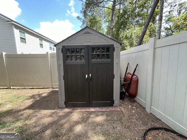143 Madeira Dr, Brunswick, GA 31523 - view of shed with a fenced backyard