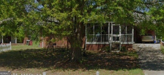 exterior space with a sunroom