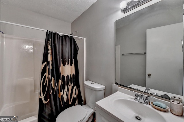 full bathroom with vanity, toilet, a textured ceiling, and shower / tub combo with curtain