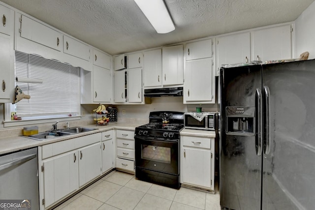 kitchen with sink, white cabinets, and black appliances