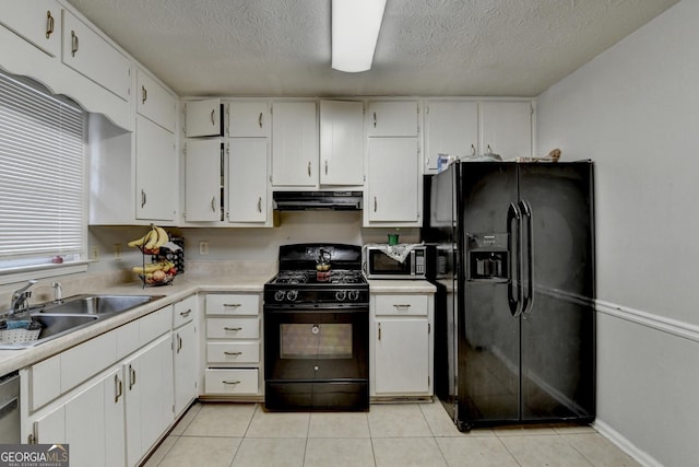 kitchen featuring sink, white cabinets, a textured ceiling, and black appliances