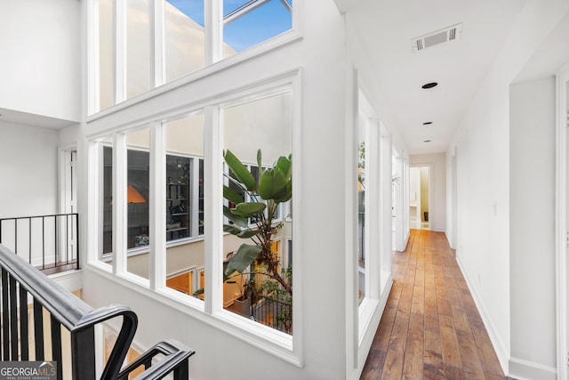 hall featuring dark wood-type flooring