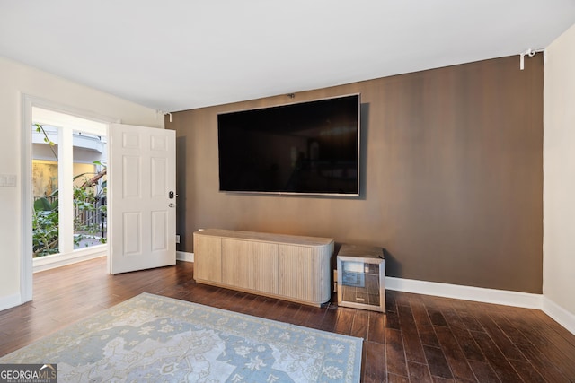 living room with dark wood-type flooring