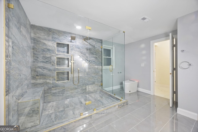 bathroom featuring an enclosed shower, tile patterned flooring, and toilet