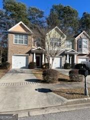 view of side of property featuring a garage