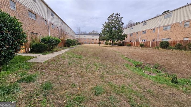 view of yard with fence