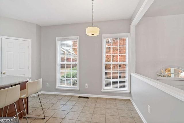 view of tiled dining space