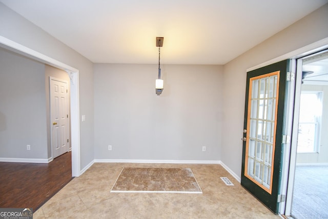 view of unfurnished dining area