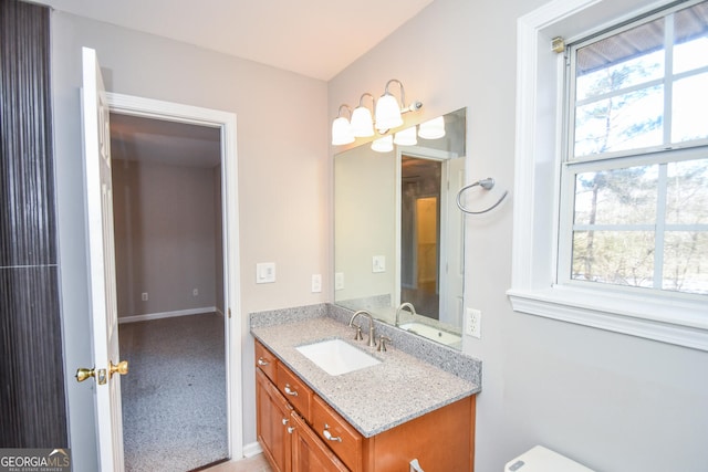 bathroom featuring vanity and plenty of natural light