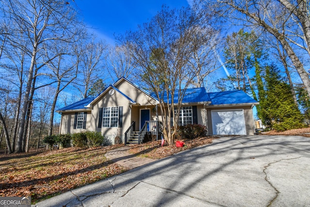 ranch-style home with a garage