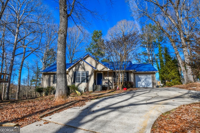 ranch-style home featuring a garage