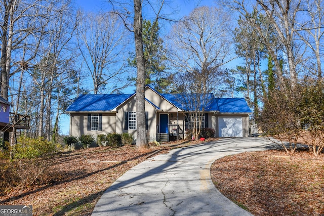 ranch-style home with a garage