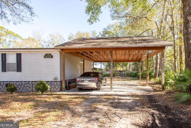 view of vehicle parking with a carport