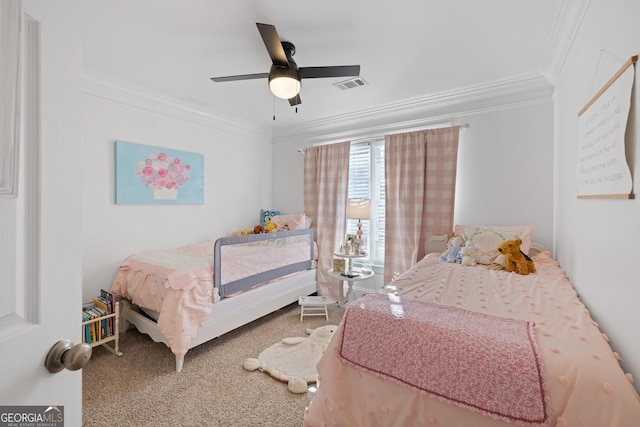 carpeted bedroom featuring ceiling fan and ornamental molding