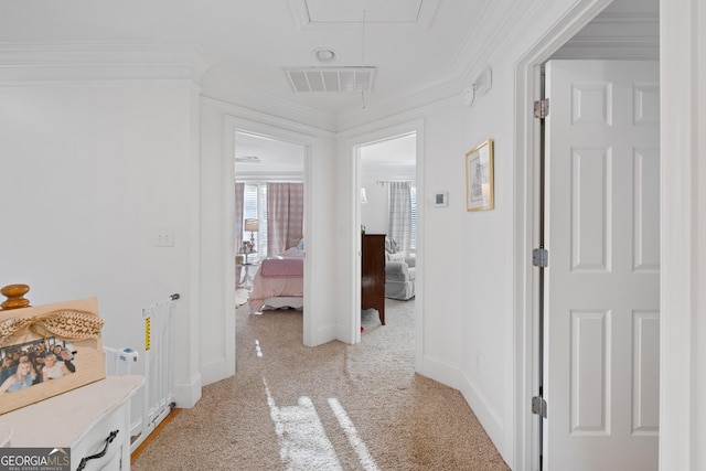 hallway featuring crown molding