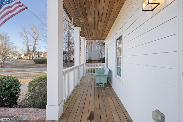 wooden terrace with covered porch