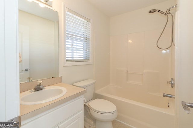 full bathroom with vanity, shower / tub combination, and toilet