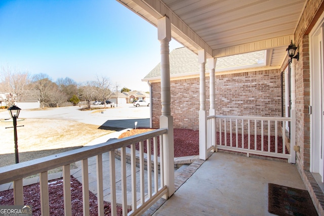 balcony featuring a porch